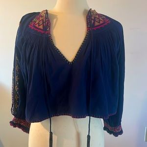 Free People cropped pheasant top. 3/4 length sleeves with embroidered sleeve